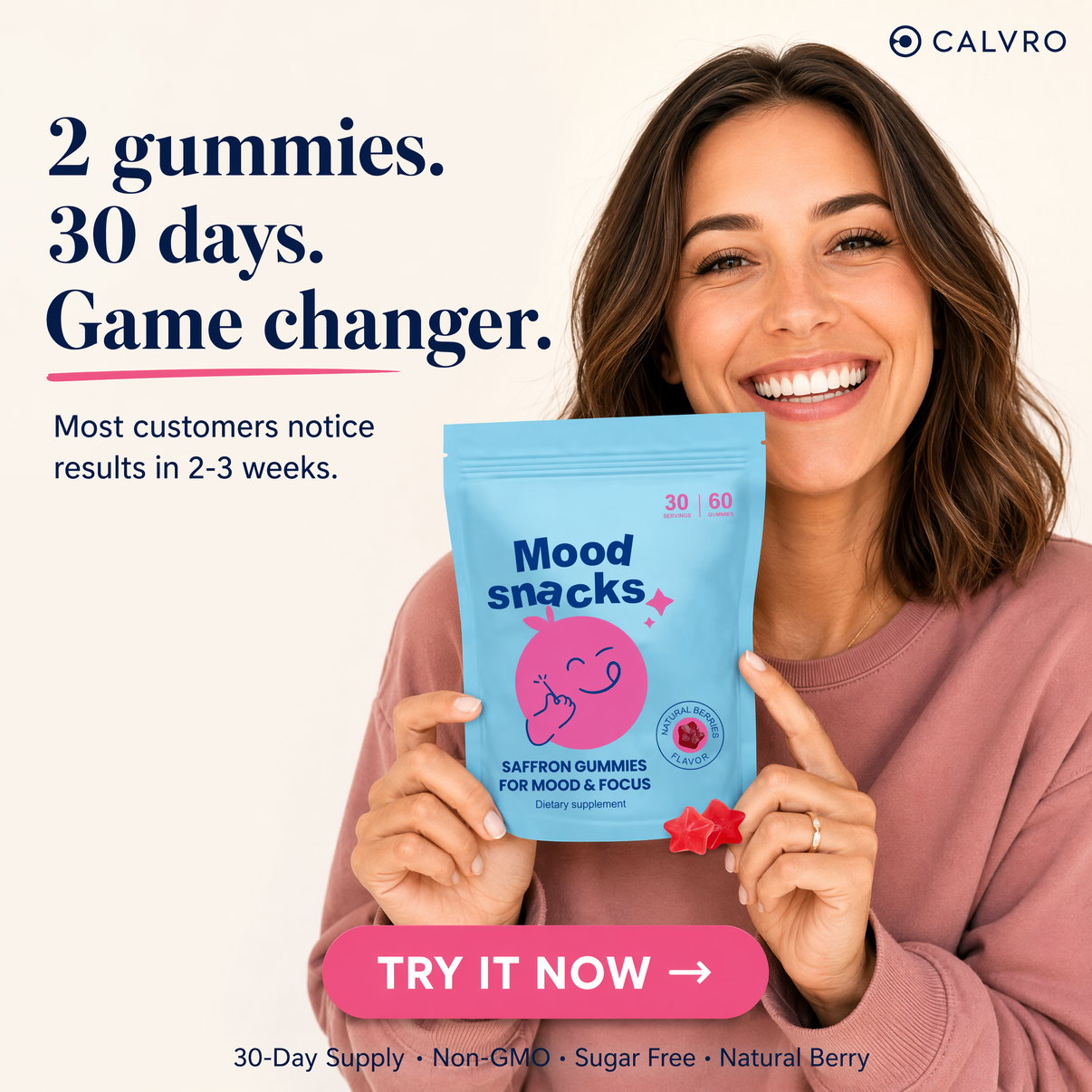 A smiling woman holds a light blue bag of Calvro Mood Snacks gummies against a light beige background with promotional text. The package is light blue with a pink cartoon gummy and the words 'Mood snacks' and 'Saffron Gummies'.